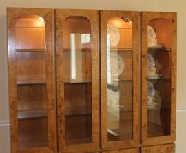China Cabinet

Measures 6'4"tall x 5'4"wide x 17"deep.

Buffet-bottom measures 24"tall, top half is 52"tall.

Manufactured by Lane Corporation. Solid, olive oak burl veneer. Double backlit. 