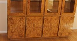 China Cabinet

Measures 6'4"tall x 5'4"wide x 17"deep.

Buffet-bottom measures 24"tall, top half is 52"tall.

Manufactured by Lane Corporation. Solid, olive oak burl veneer. Double backlit. 