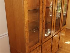 China Cabinet

Measures 6'4"tall x 5'4"wide x 17"deep.

Buffet-bottom measures 24"tall, top half is 52"tall.

Manufactured by Lane Corporation. Solid, olive oak burl veneer. Double backlit. 