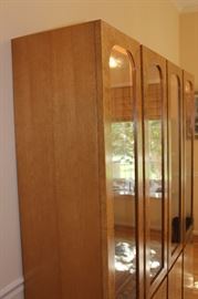 China Cabinet

Measures 6'4"tall x 5'4"wide x 17"deep.

Buffet-bottom measures 24"tall, top half is 52"tall.

Manufactured by Lane Corporation. Solid, olive oak burl veneer. Double backlit. 