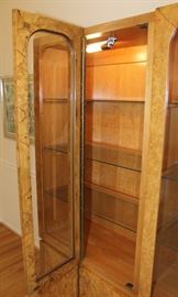 China Cabinet

Measures 6'4"tall x 5'4"wide x 17"deep.

Buffet-bottom measures 24"tall, top half is 52"tall.

Manufactured by Lane Corporation. Solid, olive oak burl veneer. Double backlit. 