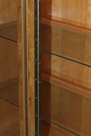 China Cabinet

Measures 6'4"tall x 5'4"wide x 17"deep.

Buffet-bottom measures 24"tall, top half is 52"tall.

Manufactured by Lane Corporation. Solid, olive oak burl veneer. Double backlit. 