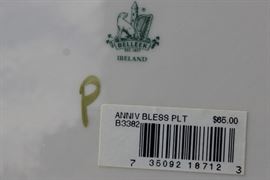  Belleek Porcelain Collection

Includes 8 pieces of fine Irish Beleek Porcelain.

1 Carlingford Cache Pot, 5 3/4"tall
1 "Happy Anniversary" Plate, 9" diameter
1 vine clock, 7 1/2"tall
1 ring holder
1 house-shaped ornament, inside marked "Thirteenth Edition"
1 Claddagh Make-Up Bell
1 leprechaun figurine, 5"tall
1 "Himself" titled mug, 4 3/4"tall

All pieces are in very good condition, no wearing of paint or chipping of ceramics. 