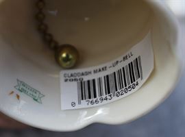  Belleek Porcelain Collection

Includes 8 pieces of fine Irish Beleek Porcelain.

1 Carlingford Cache Pot, 5 3/4"tall
1 "Happy Anniversary" Plate, 9" diameter
1 vine clock, 7 1/2"tall
1 ring holder
1 house-shaped ornament, inside marked "Thirteenth Edition"
1 Claddagh Make-Up Bell
1 leprechaun figurine, 5"tall
1 "Himself" titled mug, 4 3/4"tall

All pieces are in very good condition, no wearing of paint or chipping of ceramics. 