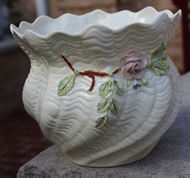  Belleek Porcelain Collection

Includes 8 pieces of fine Irish Beleek Porcelain.

1 Carlingford Cache Pot, 5 3/4"tall
1 "Happy Anniversary" Plate, 9" diameter
1 vine clock, 7 1/2"tall
1 ring holder
1 house-shaped ornament, inside marked "Thirteenth Edition"
1 Claddagh Make-Up Bell
1 leprechaun figurine, 5"tall
1 "Himself" titled mug, 4 3/4"tall

All pieces are in very good condition, no wearing of paint or chipping of ceramics. 