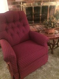 Red recliner; small side table