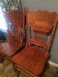 Matching antique-style chairs