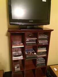 CD's and CD holder; Flat screen TV
