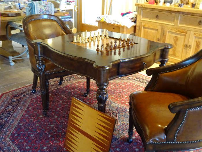 Chess/backgammon game table and two leather chairs