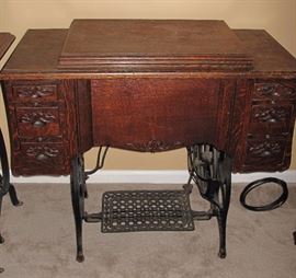  Antique oak Damascus treadle machine.