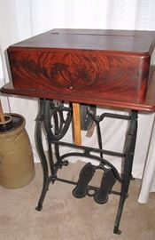 1870 Wheeler and Wilson lift top machine. Complete with glass unique presser foot insert.