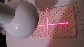 Cross hairs fabric alignment lamp.