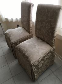 pair of silk fabric slip chairs