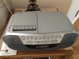 SONY plays CDs. CASSETTES AND TUNES LIKE NOBODY'S BUSINESS, THIS SALE HAS THE VINTAGE ELECTRONICS FOR YOUR LOVED ONES (give the gift of music)