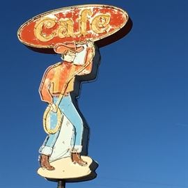 Look for the landmark Nutty Brown Cafe cowboy sign (we are on the opposite side of the road) and our black and white "ESTATE SALE" signs to direct you to the sale. SIGN IS NOT FOR SALE (wish!)