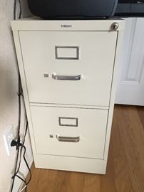 Hon filing cabinet with key.