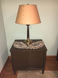 Small vintage table with sliding doors--laminate.