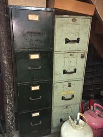 Metal and wood filing cabinets.