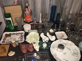 Tables full of glassware, china, and décor.