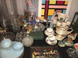 Tables full of glassware, china, and décor.