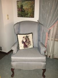 Vintage wingback chair, matching drapes.