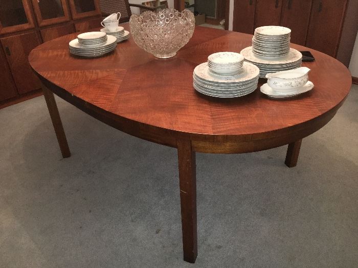 Mid Century "Founders" walnut dining table. Matching lighted china/curio cabinet and rolling expandable server/bar also available.