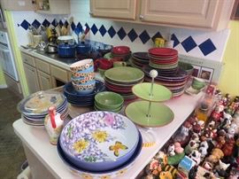 Large collection of Fiesta-like dishes, bowls, platters & cups.