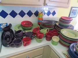 More of the Fiesta-like Dinner Ware including 4 Large platters and a nice pitcher.
