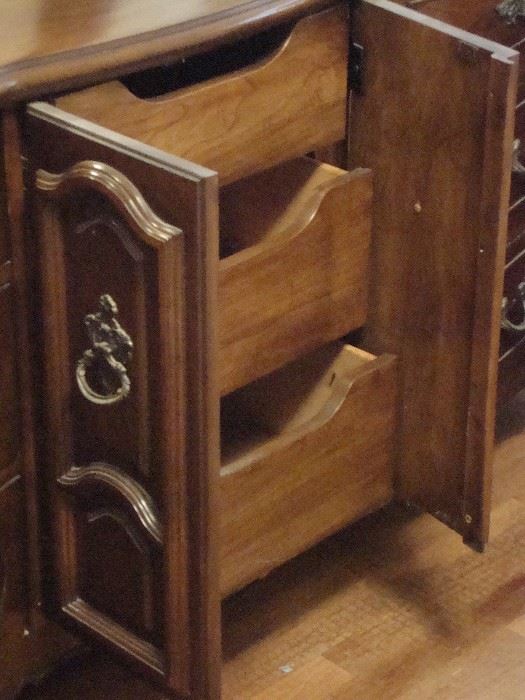 There are also drawers on both sides of these middle drawers, everything still slides well