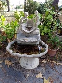 4 tiered concrete bird bath/fountain. 