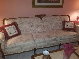 Antique sofa & throw pillows. 