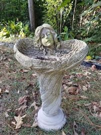 Concrete angel bird bath
