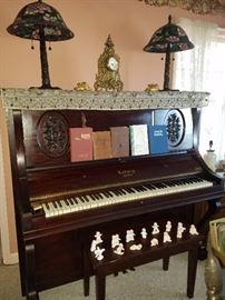 Ludwig upright piano circa early 1900s, stained glass lamps, clock, Snow babies, & more.