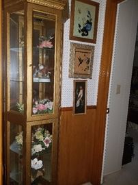 Curio cabinet, Capodimonte floral candle holders, original art work by Mrs. Bennett (reverse glass paintings). 