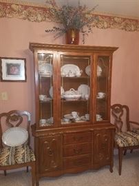 China cabinet & white china with gold trim. 