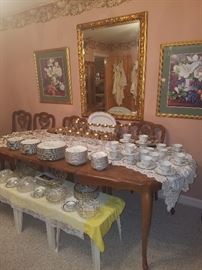 Dining table with chairs, magnolia prints, large mirror, table cloth, crystal/cut glass, & more. 