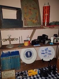 Vintage wooden pinball game, Polaroid vintage cameras, Alcatraz, Jimmy Carter inaugural plate, Bleckley County commemorative plate, Useful toilet soap wooden box. 