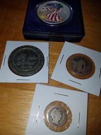 Paradise Island casino token, silver coins. 