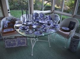 White Wicker with cast iron legs chairs and glass top table