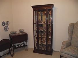 Ethan Allen lighted display cabinet & some of the 75+ Hummels
