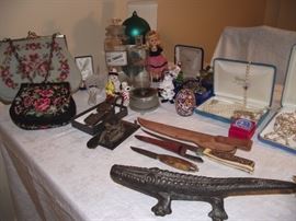 Needlepoint purses, antique telegraph key, cast iron cigar press alligator