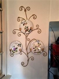 several plate racks with decorative plates