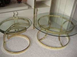 Brass and glass round coffee table and end table.