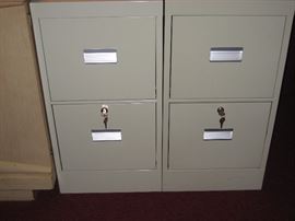 Two drawer file cabinets with locks.