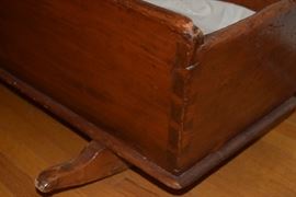 Detailing on antique child's cradle