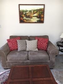 Pottery Barn Microsuede Sofa with excellent feather and down pillows -- also wonderful square wood coffee table