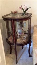 GORGEOUS ROUNDED GLASS TABLE.  SOME PIECES NEED REPLACED