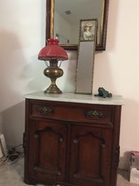 Marble topped antique washstand, mirrors and lamp