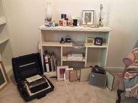 Vintage typewriter, and a great bookcase!