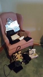 A sampling of purses. To include Coach & other high end brands
